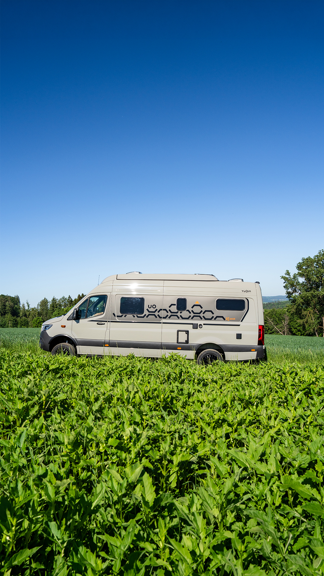 Yucon K-peak – Off-Road Campervan Side View Yucon K-peak – Off-Road Campervan Side View