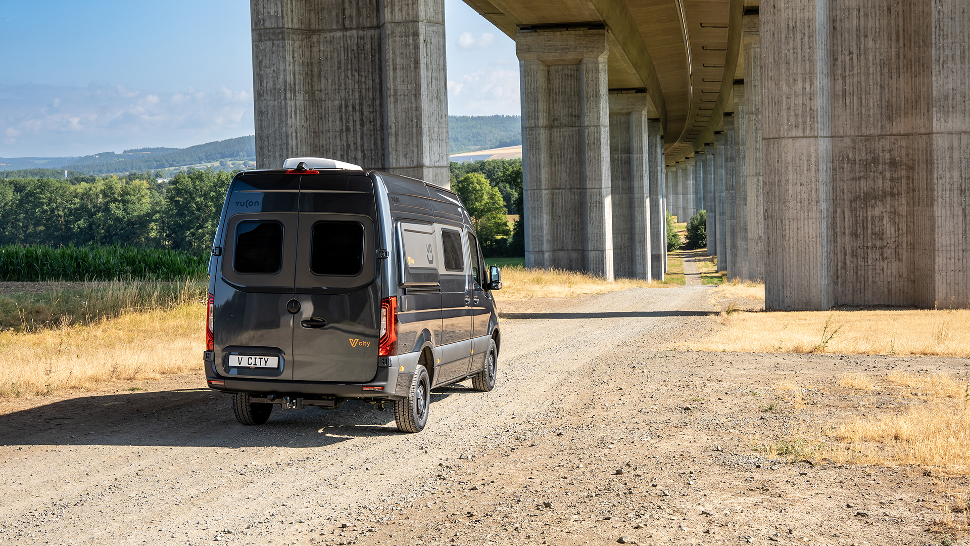 Yucon V-city Campervan – Rear view Yucon V-city Campervan – Rear View